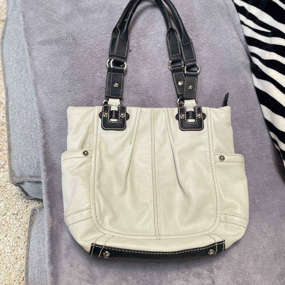 Elegant Tignanello Cream and Black Women's Handbag